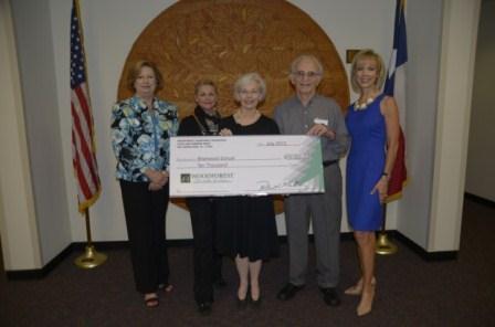 Briarwood School receives $10,000 donation from the Woodforest Charitable Foundation.