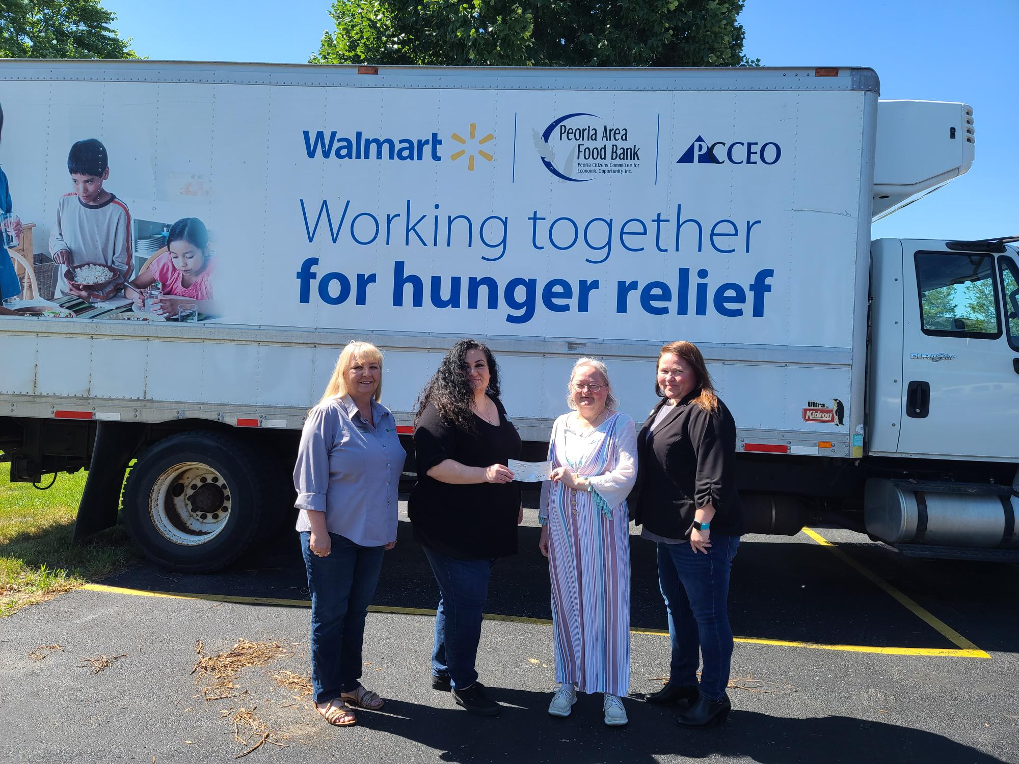 Peoria Area Food bank received a $2,800.00 donation from WCF.