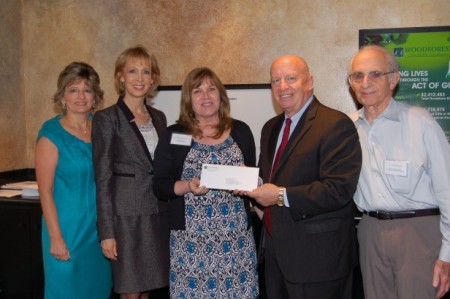 Grief Resource Center receives $2,000 donation from Woodforest Charitable Foundation.