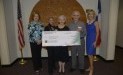 Briarwood School receives $10,000 donation from the Woodforest Charitable Foundation.