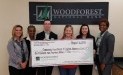 Community Food Bank of Central Alabama received a $6,900 donation from WCF.