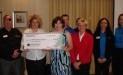 Weinberg Regional Food Bank receives $1,050 donation from the Woodforest Charitable Foundation.